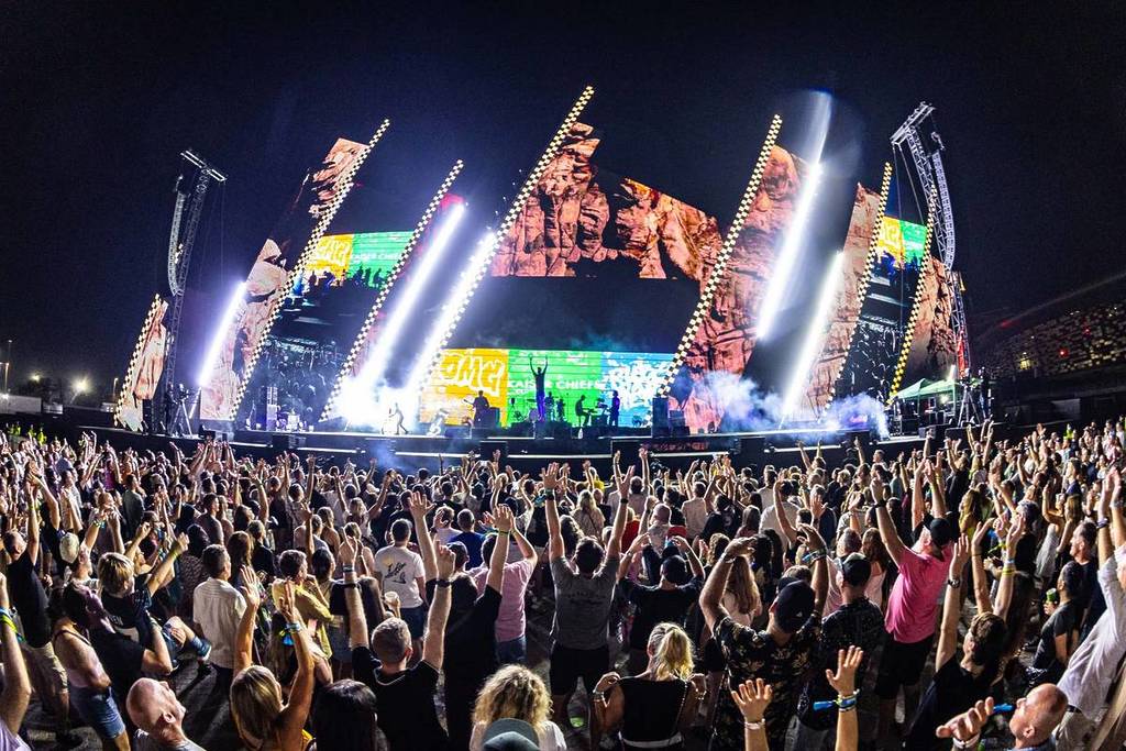 A crowd cheering at an electrifying performance at the OFFLIMITS Festival
