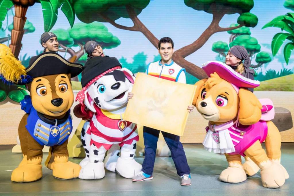 A close up shot of the cast members on stage at PAW Patrol Live! "Heroes Unite" dressed in pirate attire 