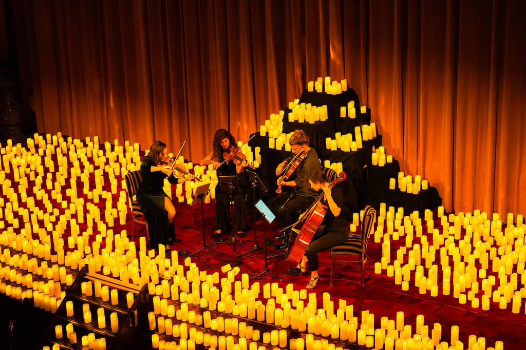Concierto Candlelight cuarteto de cuerda entre miles de velas