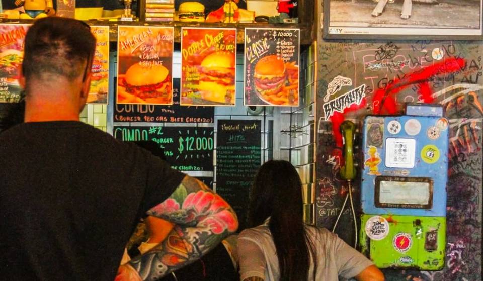 Palermo’s iconic “Cueva” burger joint with graffiti-covered walls that looks like it was plucked from a New York street
