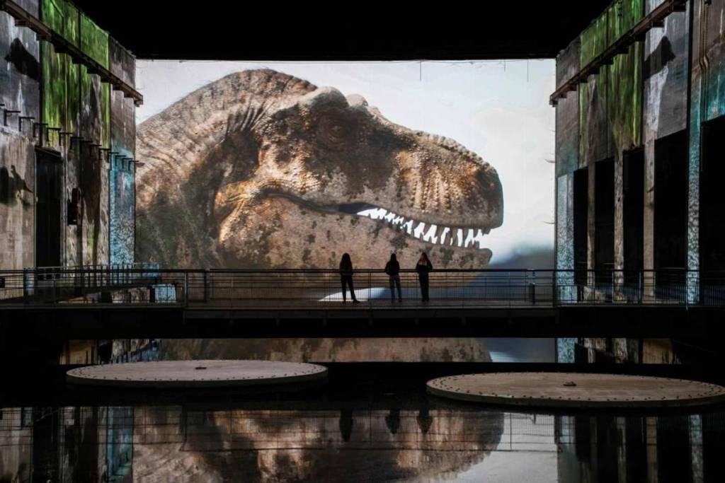 “Prehistoric Planet: Dinosaurs” Exhibition at the Bassins des Lumières in Bordeaux