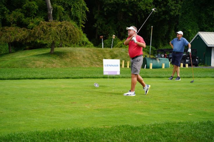 man golfing