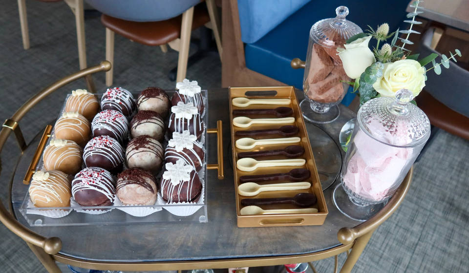 This Restaurant Serves A 4-Flavor Tableside Hot Cocoa Cart At Seaport Waterfront