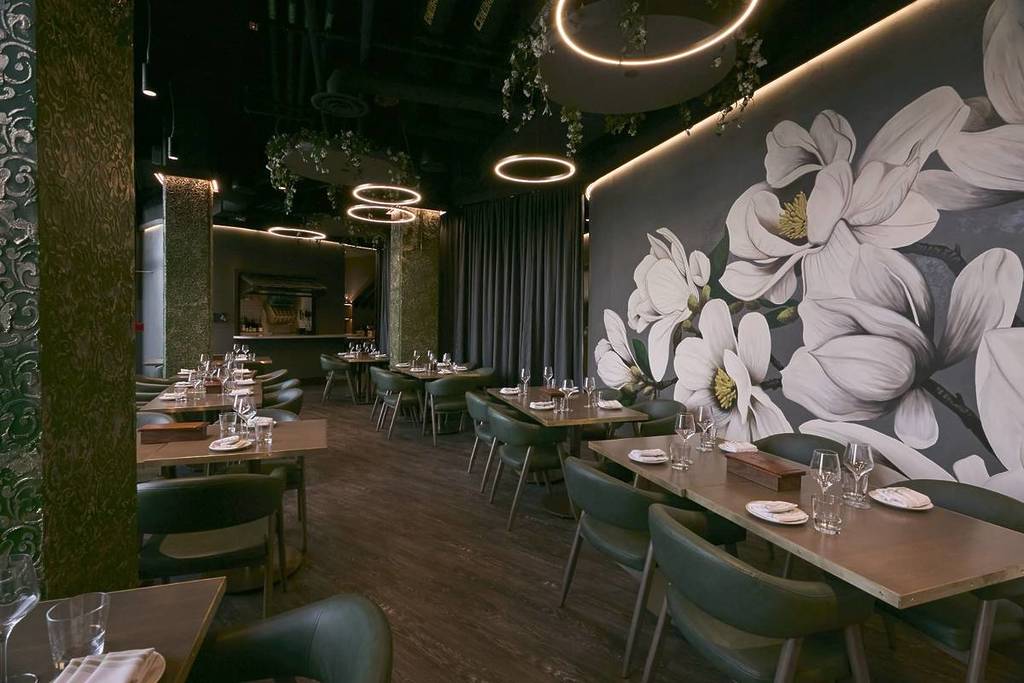 The Block at Woods Hill Dining Room with floral decor