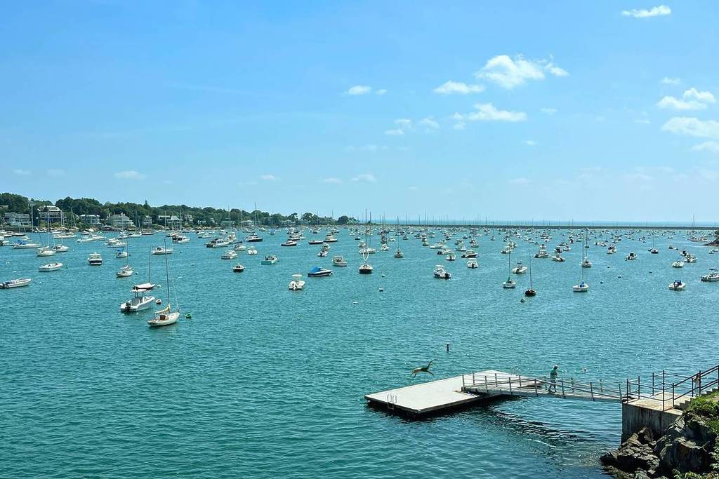 man diving view of the swimming dock at crocker park in marblehead
