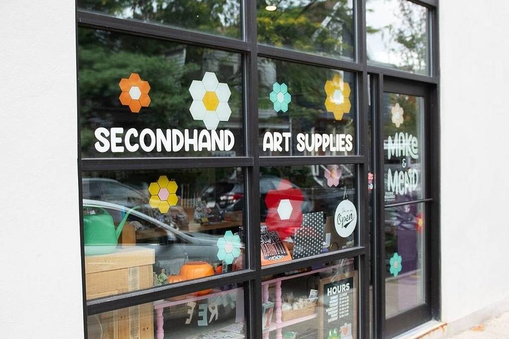 exterior of storefront that reads 'secondhand art supplies'