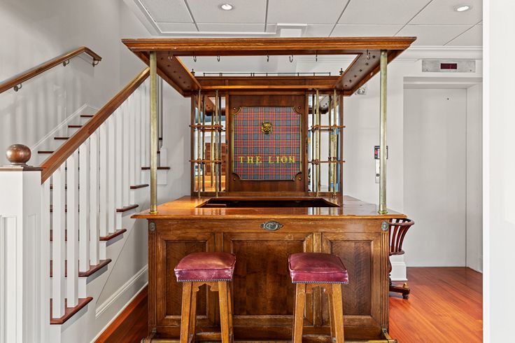 vintage tartan red and wood concierge booth