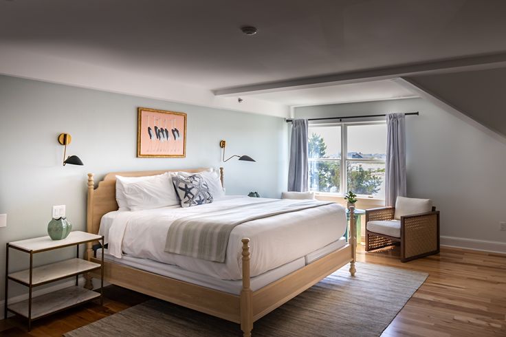 luxe guestroom in hotel with waterfront view