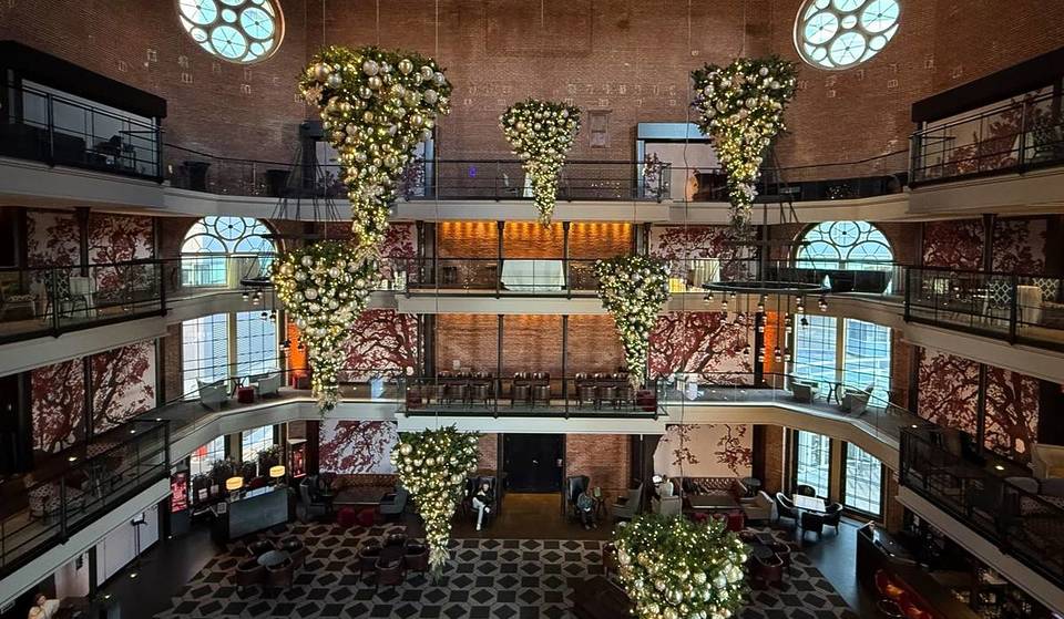 Former Boston Jail Turned Boutique Hotel Hosts First-Ever Indoor Christmas Stroll In 1 Week—With Dazzling Upside Down Christmas Trees & Local Gifts