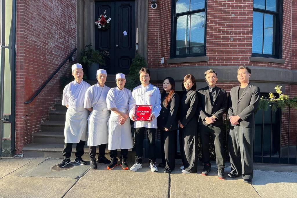 311 omakase team of chefs with michelin plaque