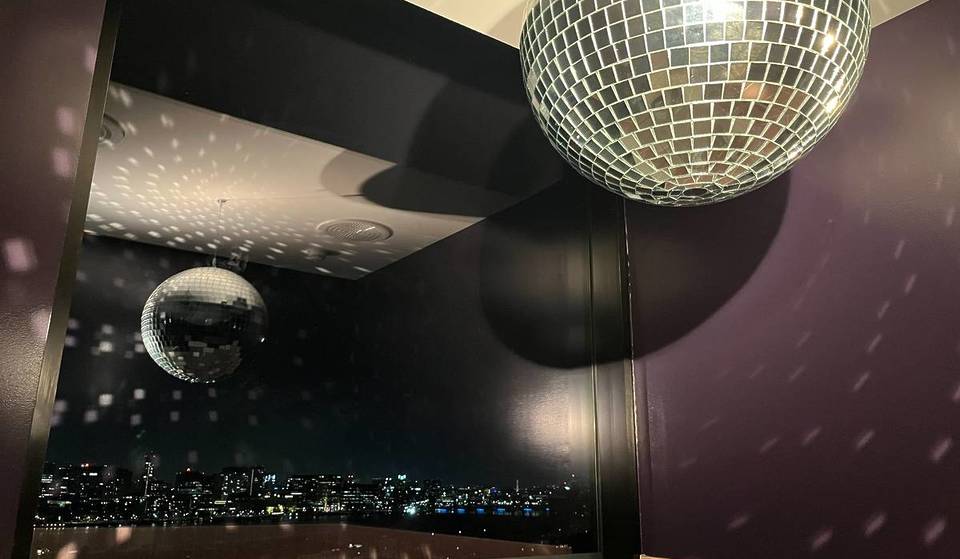 Boston’s Most-Glamorous Photo Opportunity Is Hidden Inside A Bathroom Stall Of This Ritzy Rooftop Restaurant—With Dazzling Disco Balls And Aerial City Views