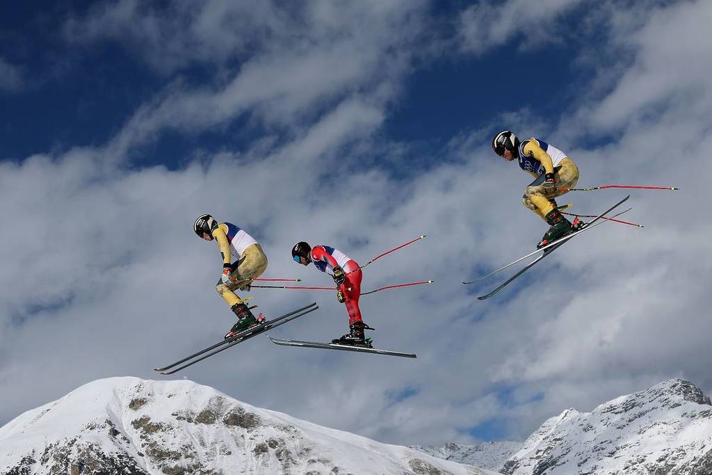 Kevin Drury of Team Canada, Florian Wilmsmann of Team Germany and Tim Hronek of Team Germany participate in Men's Freestyle Skiing Ski Cross Training on day minus three of the Milano Cortina 2026 Winter Olympic games at Livigno Air Park on February 03, 2026 in Livigno, Italy.