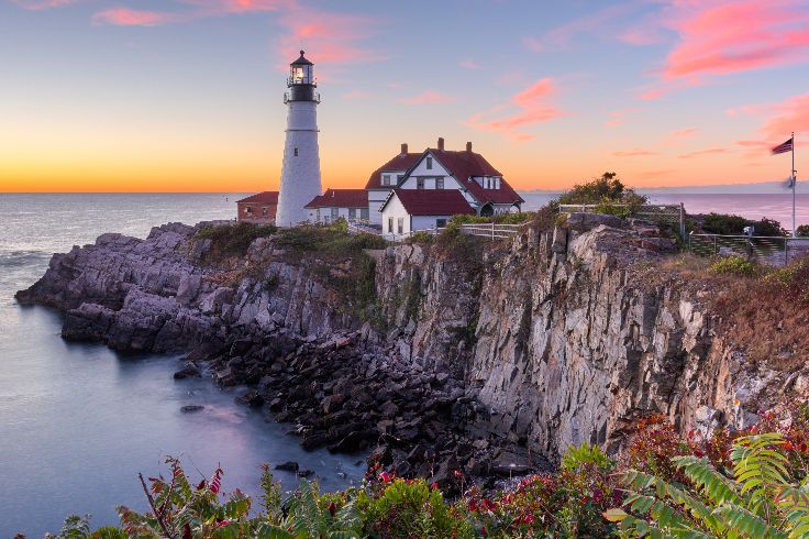 Portland head light on ocean cliffs