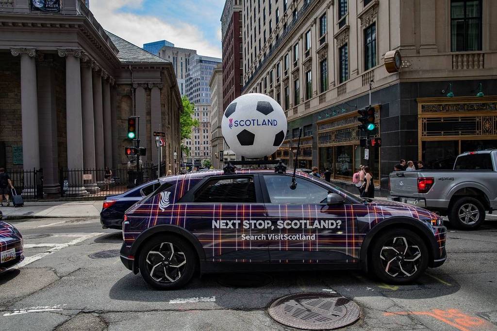 A fleet of 11 tartan taxis takes over Boston this weekend—with a chance to win a $5K trip to Scotland