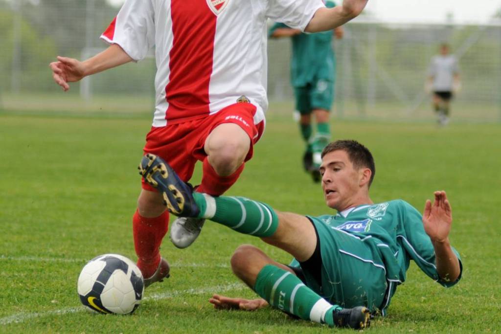men playing soccer