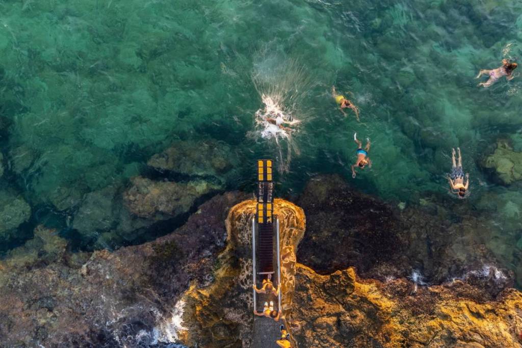 people playing on Mollet de Sa Rapita trampoline, Campos, Majorca, Balearic Islands, Spain