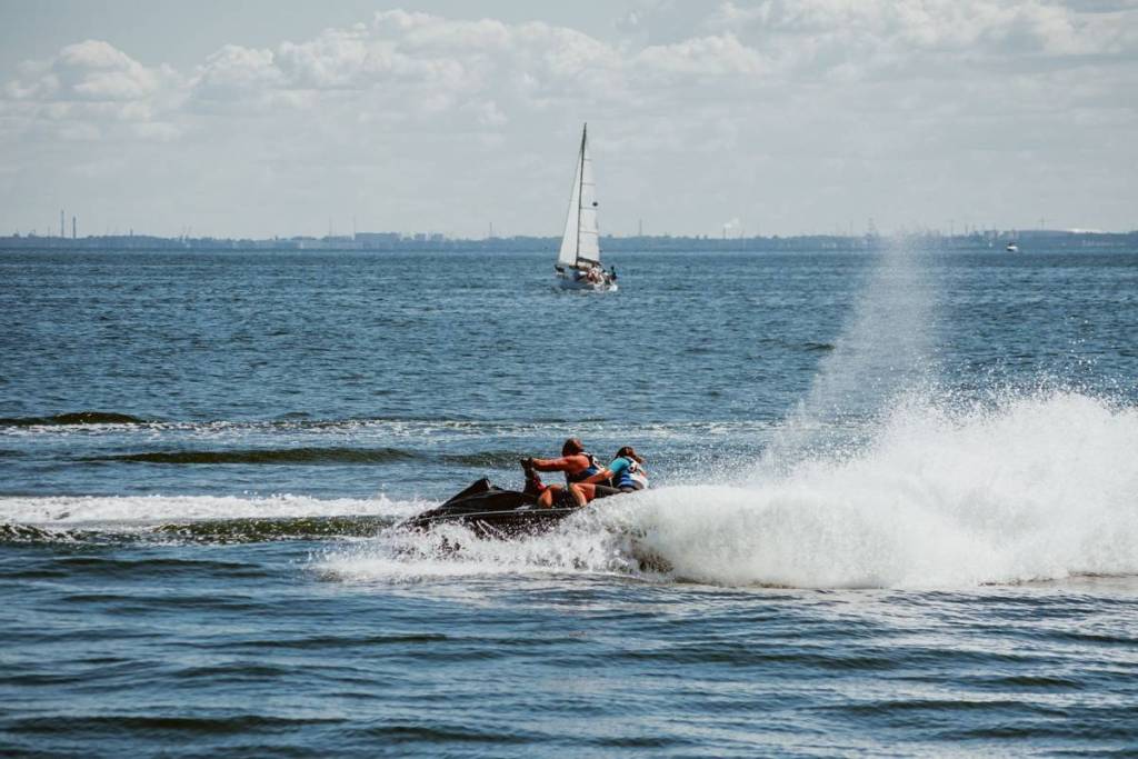 two people riding jet ski