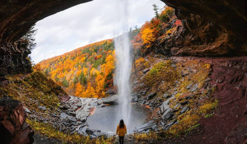Located inside a 7,620-acre forest just 3.5 hours from Boston, this dramatic two-tiered waterfall drops 260 feet through red, orange, and gold autumn foliage