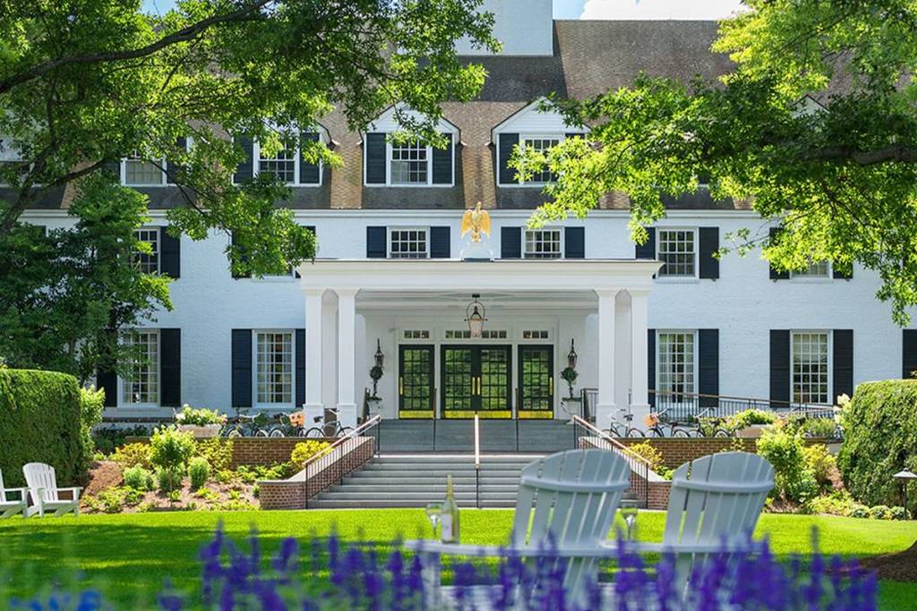 facade in spring The Woodstock Inn & Resort