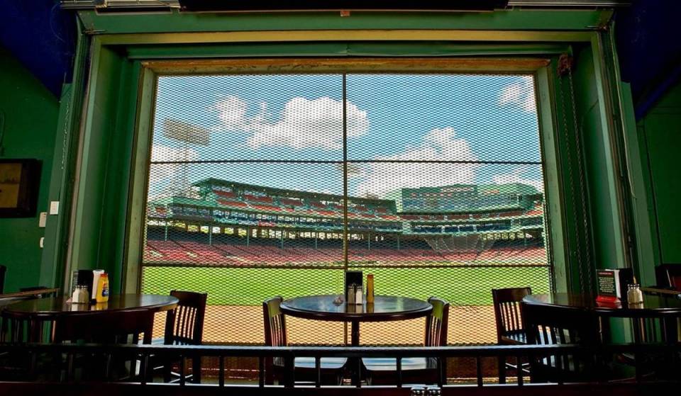 Hidden behind this underground garage door is a full-service restaurant with direct views of Fenway Park