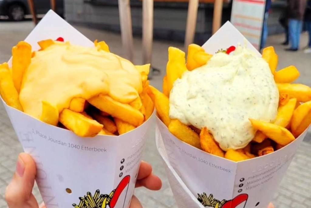 cones of fries with sauces