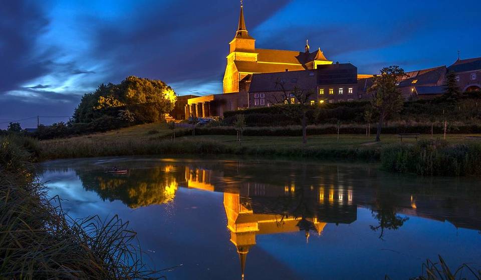 An hour and a half from Brussels, this charming village in Wallonia is a true romantic gem that few people know about—it hides a 17th-century castle farm and a dreamlike old railway line.
