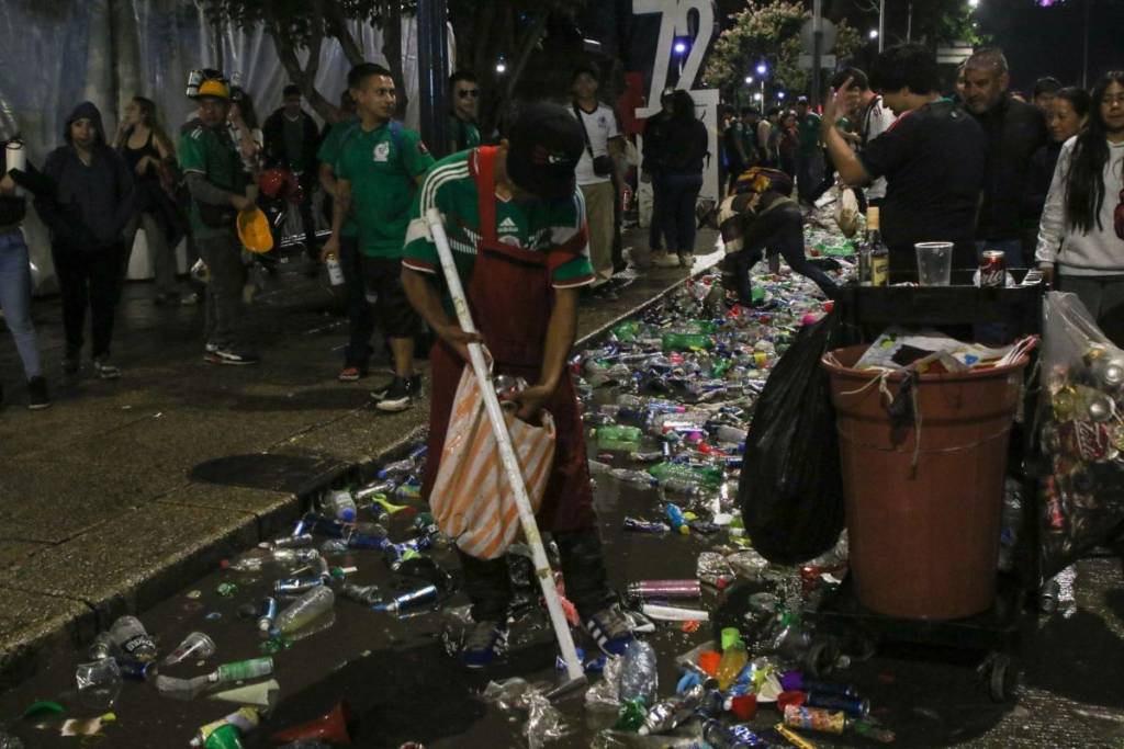 distribution of trash bags for cleanup after the match celebrations