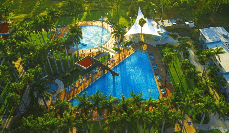 5 hot spring pools, extreme water slides, and a wave pool at La Caldera Water Park