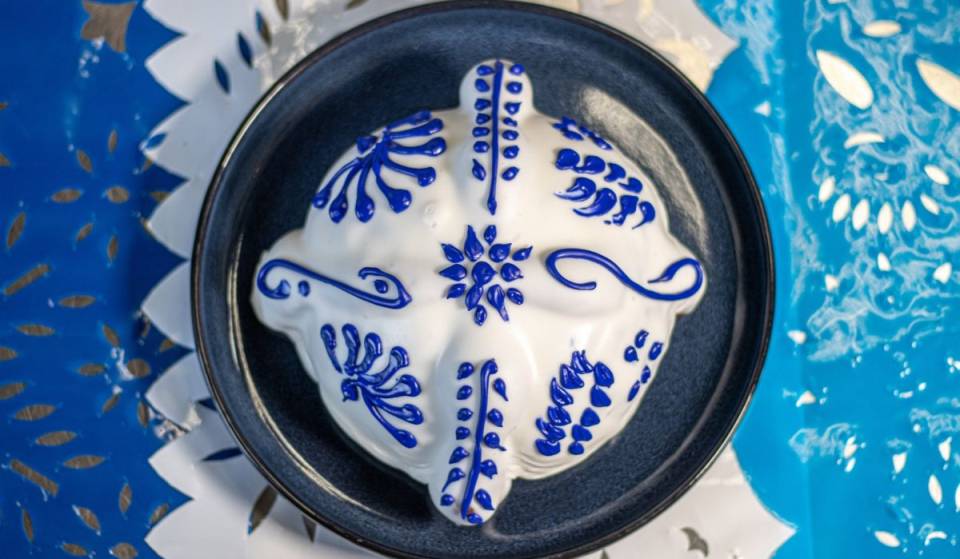The hand-painted Talavera-style pan de muerto that arrived in Coyoacán