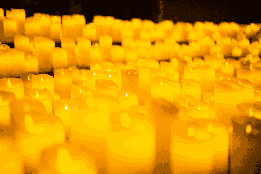 Close up of a sea of candles