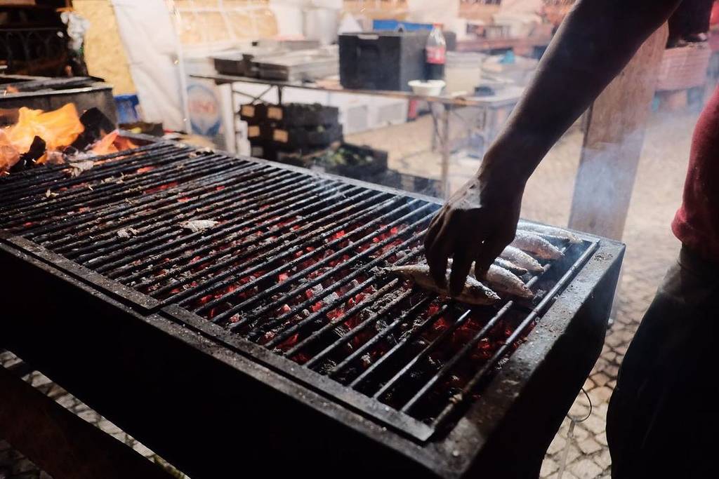 grilled sardines at the popular saints’ festivals in Lisbon at Praça da Alegria