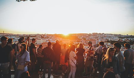 people at a viewpoint in lisbon