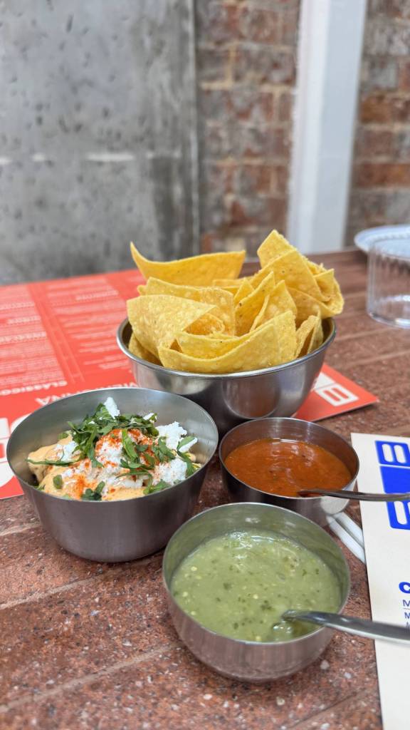 esquites and nachos with guacamole at the Mexican restaurant La Ruda 