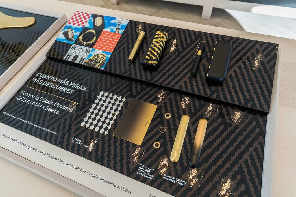 Coro Góspel, Chocolate con churros y premios exclusivos: así es la agenda de la boutique IQOS de la calle Serrano