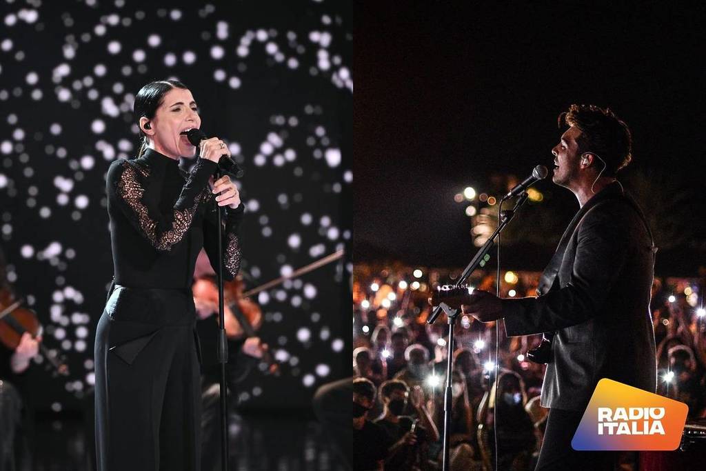 Giorgia y Stash, de The Kolors, cantan en el escenario vestidos de negro e iluminados por las luces