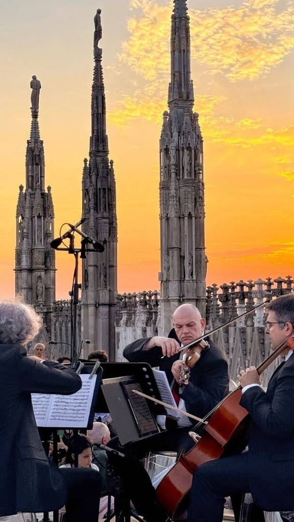 Violins and violas in concert at sunset