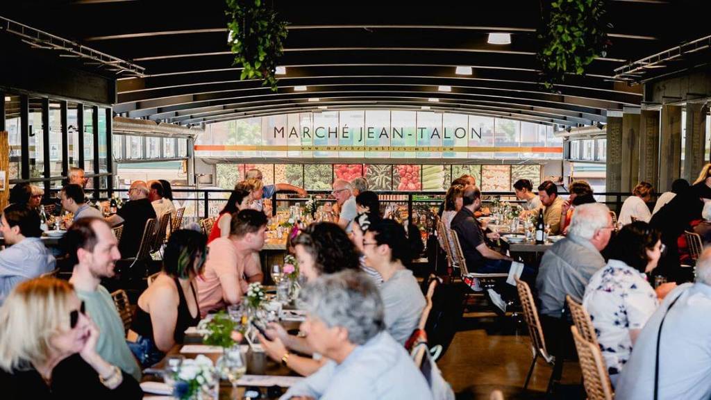 The Jean Talon market offers an old-fashioned long table and gourmet meal