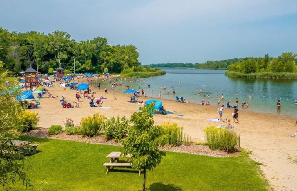 45 minutes from downtown Montreal—a lovely beach for swimming in a clear lake dotted with small islands this summer