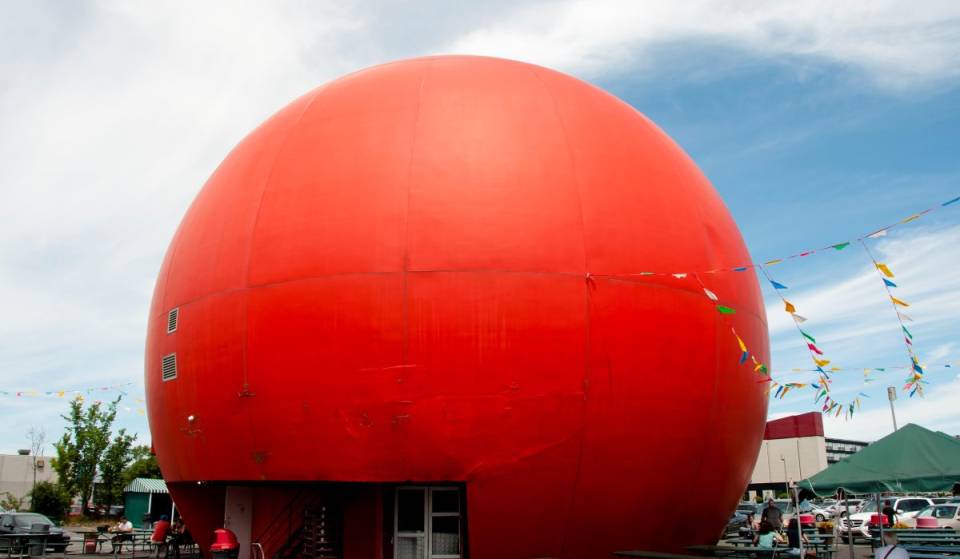 Iconic Montreal—the Orange Julep on Décarie Boulevard, the fast-food restaurant housed in a giant concrete orange, is the most beautiful spot in Montreal to watch the sunset