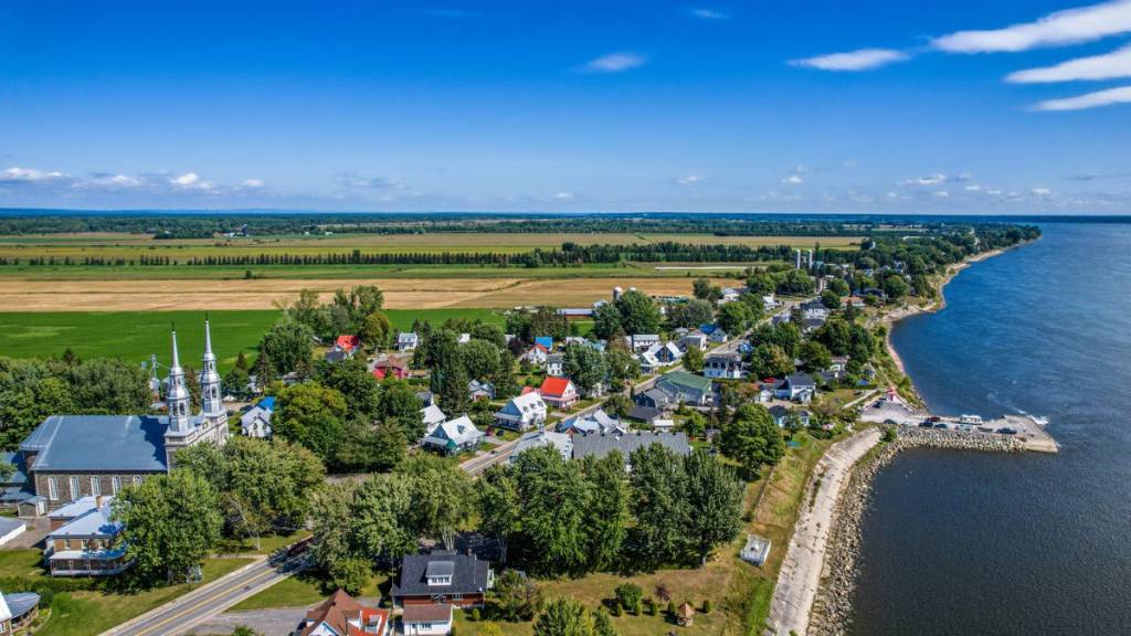 1 hour and 50 minutes from downtown Montreal—a historic waterfront village to explore by bike this summer