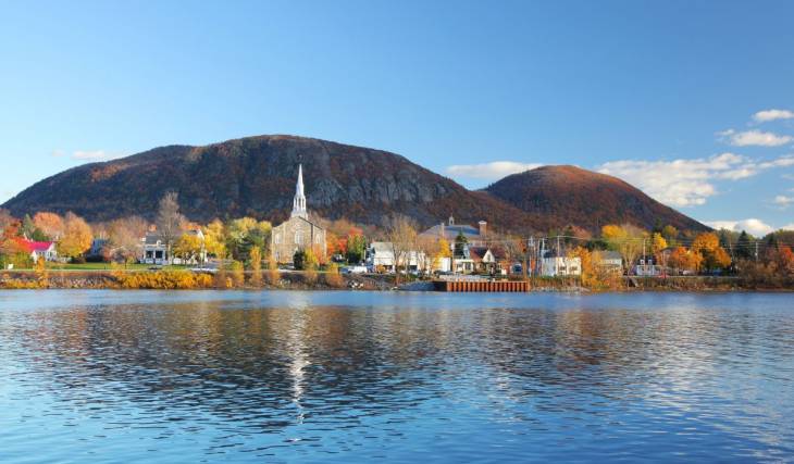 Just 45 minutes from downtown Montreal—a pretty village with a mysterious mountain, accessible by public transit, worth visiting this fall