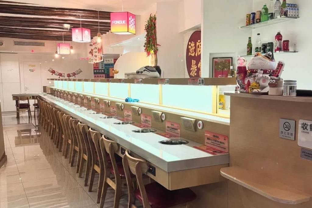 This all-you-can-eat Chinese buffet serves your food in miniature trains &#8211; and specializes in fondue!