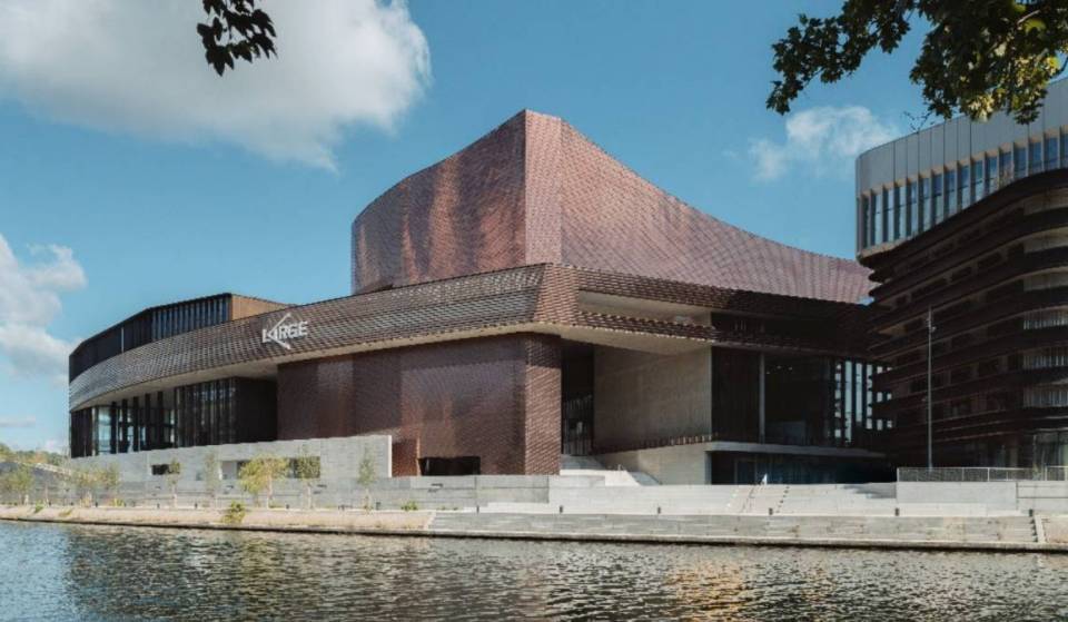 In Paris, a massive 5,000-square-meter contemporary art center surrounded by the Seine, featuring a movie theater and hotel, set to open in 2026