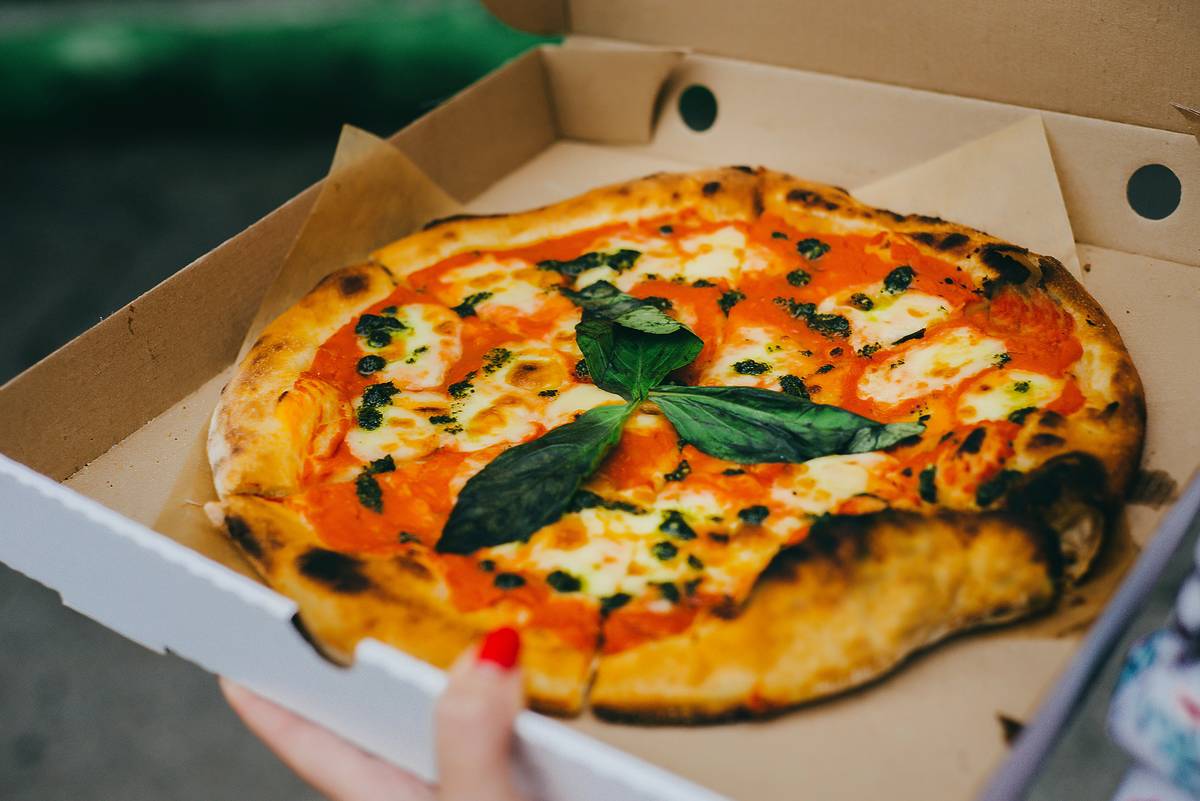 A pizza in a pizza box