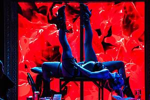 Cabaret performers dance onstage