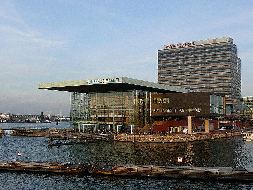 A view of the striking exterior of Muziekgebouw aan ’t IJ from the water.