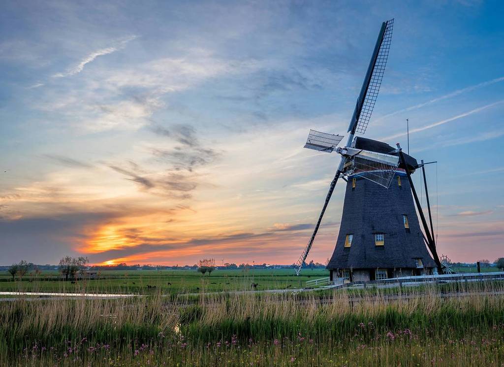 Sunset with a windmill in view
