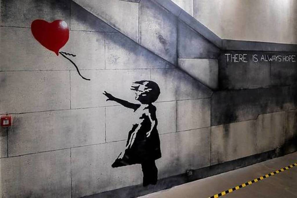 Mural of a little girl and a red balloon