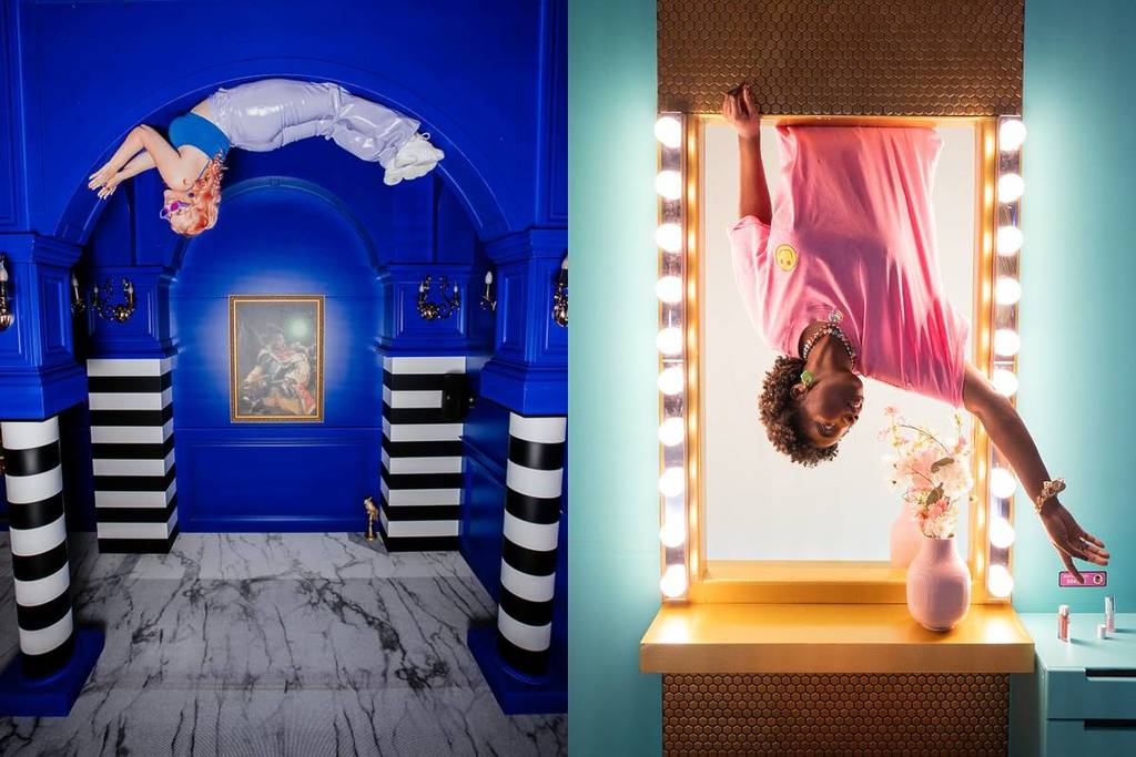 Dos personas en una habitación invertida con arcos arquitectónicos y un espejo que refuerza la ilusión.