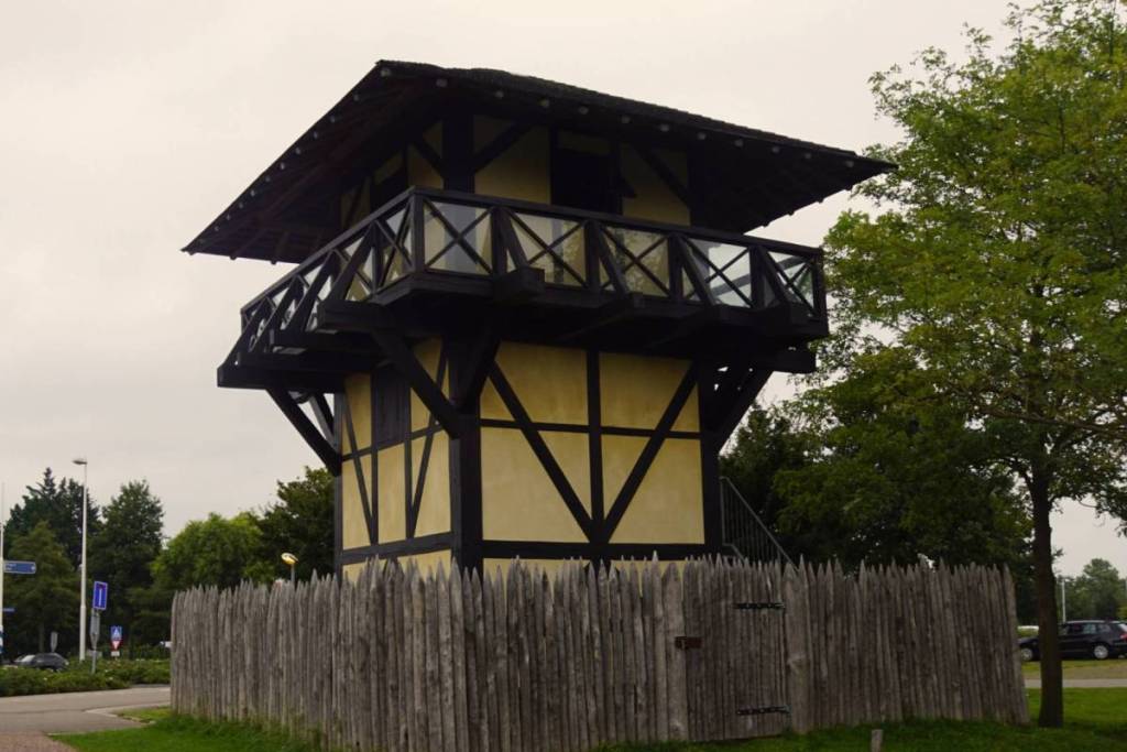 Reconstruction of a Roman wooden watchtower with a wooden palisade fence at Castellum Hoge Woerd.